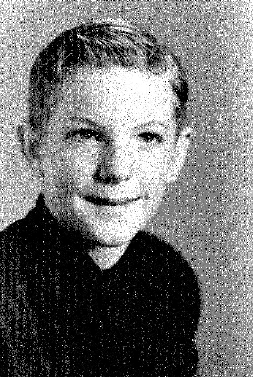 Headshot of young Mitch Oakley